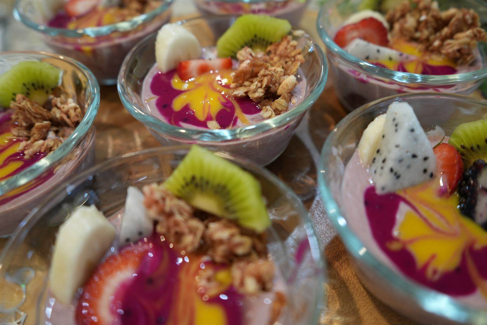 Dragon fruit yogurt parfaits with kiwi and granola