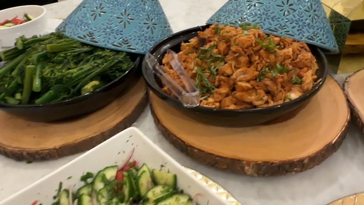 A family-style buffet laid out on a kitchen island